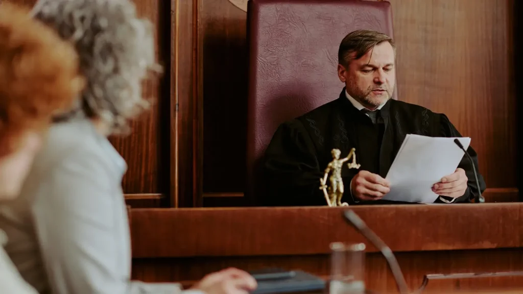 image depicting a judge examining evidence